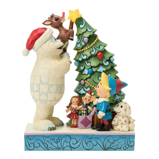 Bumble Holding Rudolph by Tree