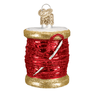 Red Spool Of Thread
