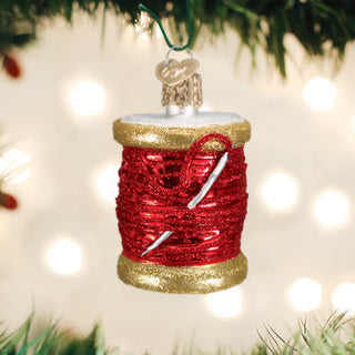 Red Spool Of Thread
