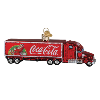 Decorative Christmas ornament of a Coca-Cola truck on a white background