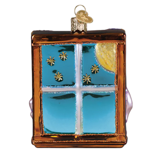 Decorative glass ornament resembling a window with a whale, moon, and stars.