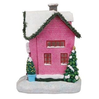 Pink Christmas house with snow and trees on a white background