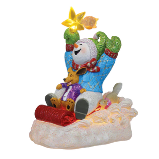 Decorative figurine of a snowman with a mouse, surrounded by festive elements on a white background.