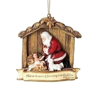 Kneeling Santa in Manger