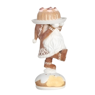 Gingerbread Gnome Standing On Cake