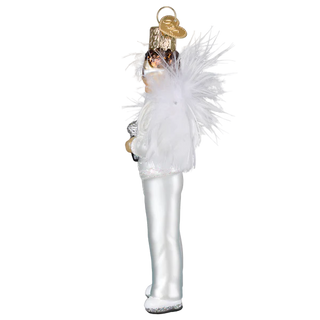 Decorative ornament Elton John in a white dress with a large white feathered boa on a white background