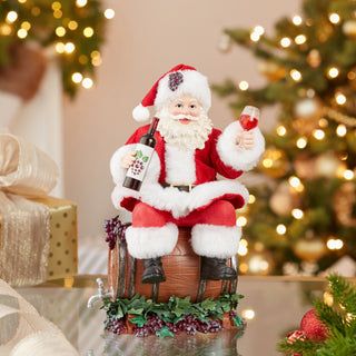 10.5" Fabriché™ Santa Sitting on Wine Barrel