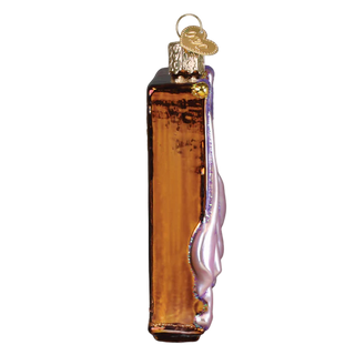Decorative glass ornament shaped like a bottle with a cork on a white background