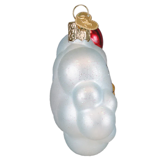 Glass ornament shaped like a cloud with a red and gold tag on a white background