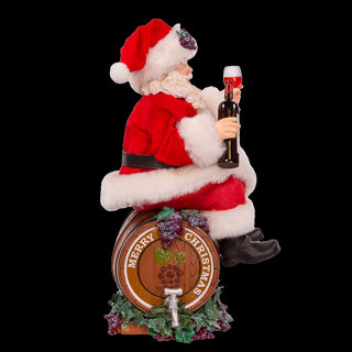 10.5" Fabriché™ Santa Sitting on Wine Barrel